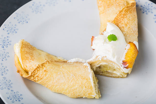 istock Pancak with cottage cheese and peach doused sour cream 491232298