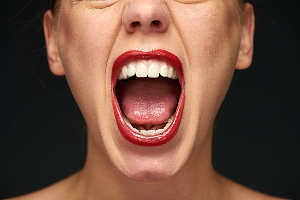 fury - human mouth human teeth indoors young women fotografías e imágenes de stock