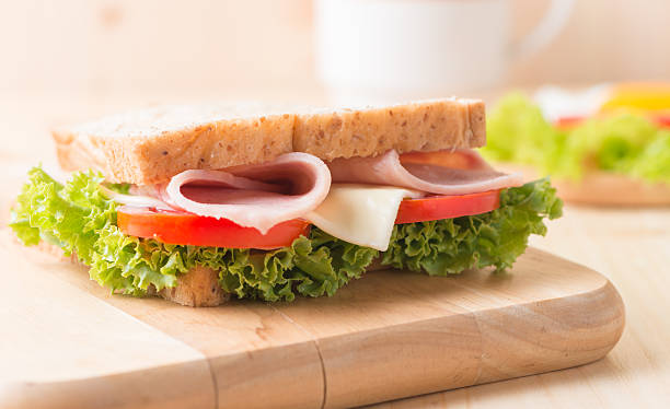 istock sandwich on wood plate. 491242822