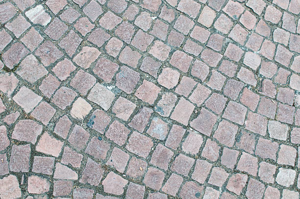 istock Gray Cobblestone pattern in the street ground bulgaria 491242845