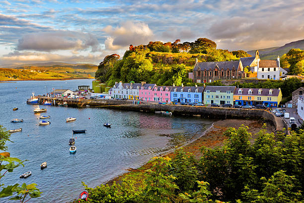 view on Portree, Isle of Skye, Scotland view on Portree before sunset, Isle of Skye, Scotland scottish highlands stock pictures, royalty-free photos & images