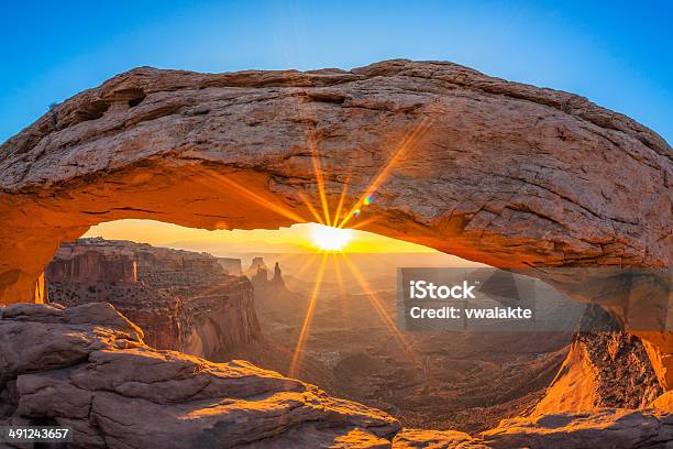 Famous Sunrise At Mesa Arch Stock Photo - Download Image Now - Canyon, Mesa Arch, Natural Arch