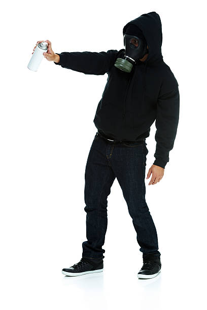 istock Graffiti artist in action with aerosol can 491244089