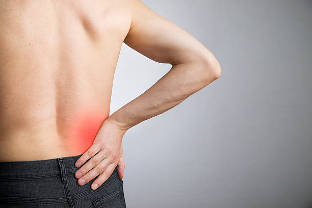 腰の痛みに - lower back pain ストックフォトと画像