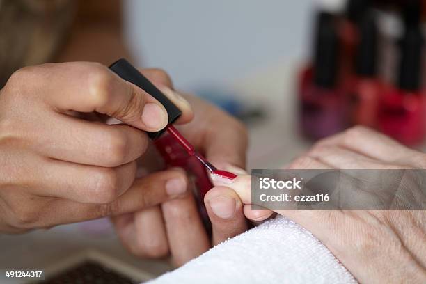 Woman In Beauty Salon Having Nails Treated Stock Photo - Download Image Now - Adult, Afro-Caribbean Ethnicity, Beautician