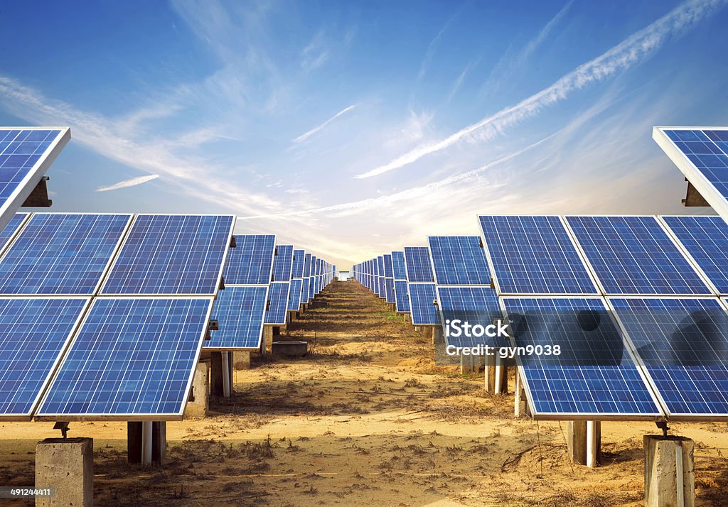 Solar Panel In the evening, when the solar panels Agricultural Field Stock Photo