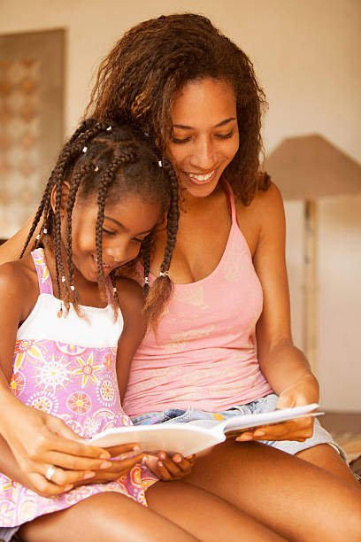 istock Mother and Daughter Studying 491244415