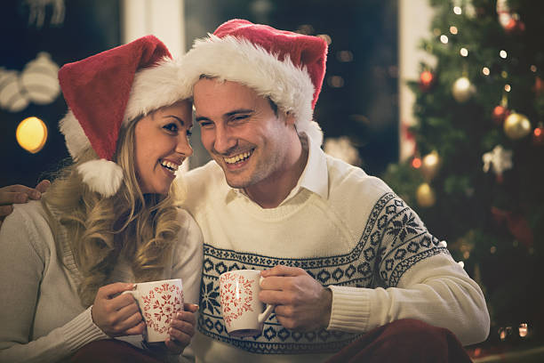 istock Couple drinking coffee together during Christmas holidays 491244480