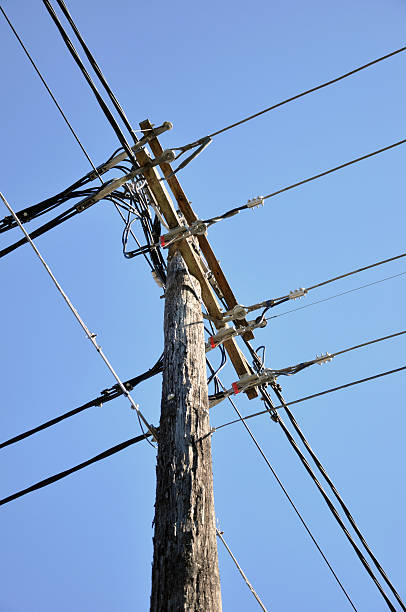 istock Old wooden electricity post 491244593