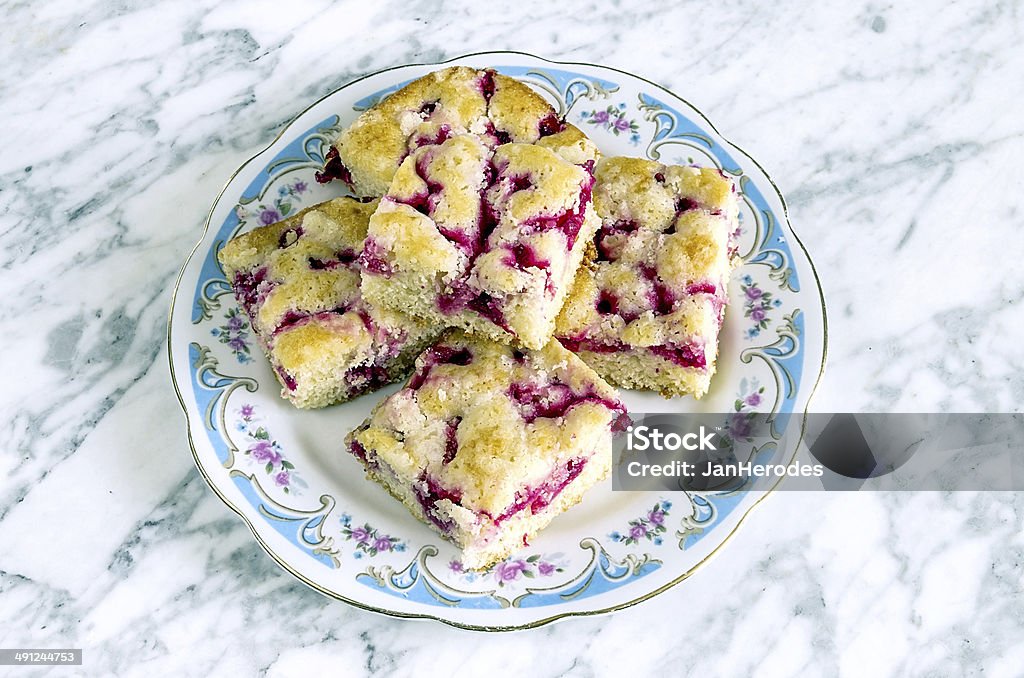 Homemade currant cake Homemade currant cake on a plate on a marble table Afternoon Tea Stock Photo