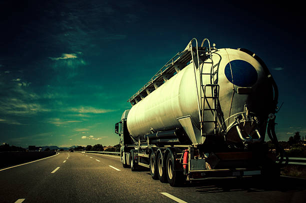on the road - fuel tanker oil refueling fossil fuel стоковые фото и изображения
