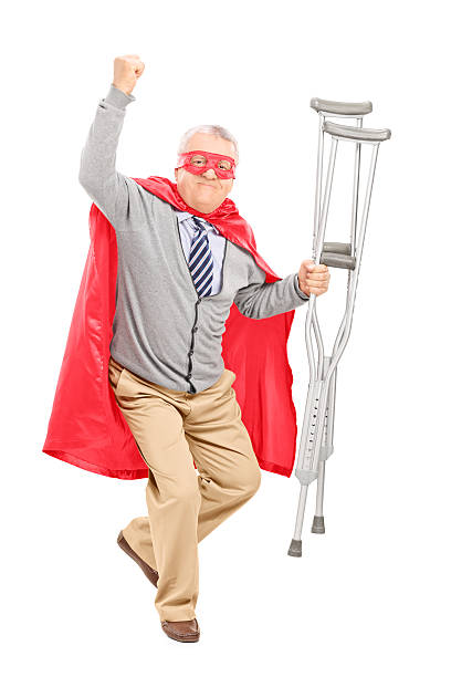 スーパーヒーローに crutches 身ぶり幸福 - mask superhero heroes men ストックフォトと画像