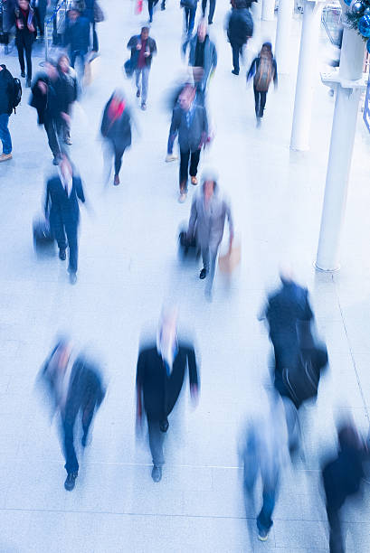 istock Blur Movement people in Rush Hour train station, London, UK 491247111
