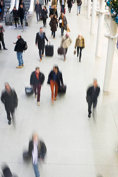 istock Blur Movement people in Rush Hour train station, London, UK 491247125