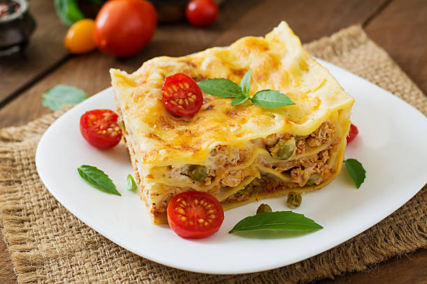 istock Lasagna with minced meat, green peas and sauce 491247462