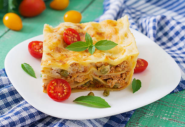 istock Lasagna with minced meat, green peas and sauce 491247686