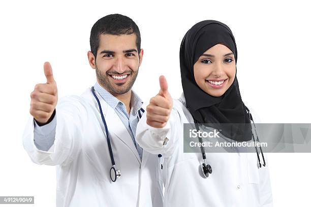 Arab Saudi Emirates Doctors Happy With Thums Up Stock Photo - Download Image Now - Arabia, Doctor, United Arab Emirates