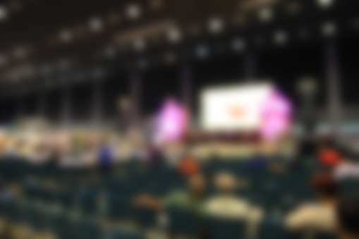 trade show area and people. Blurred image background