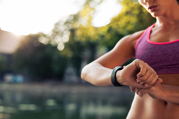 istock Woman setting up the smartwatch for running 491249122