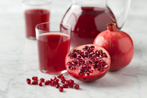 Fresh pomegranate juice in a jar