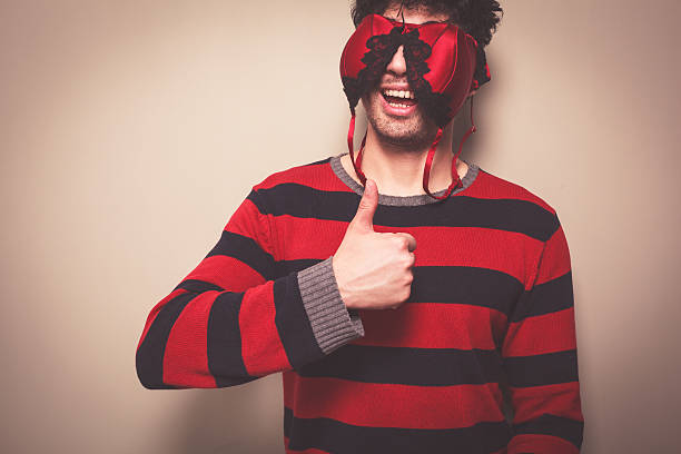 istock Man with bra on his face giving thumbs up 491250155
