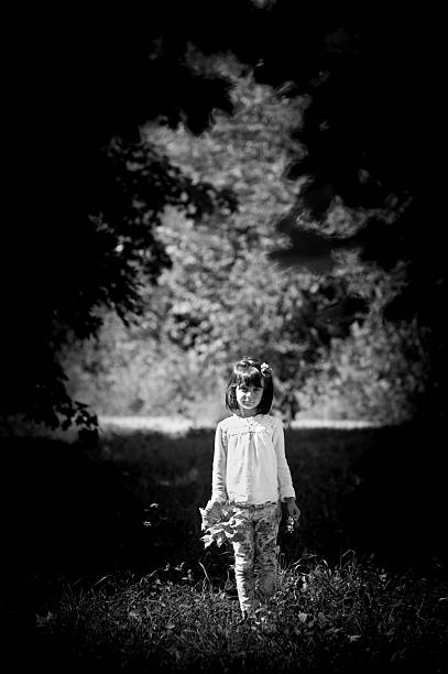 istock girl with leaves in her hand 491262744