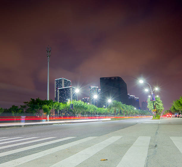 istock Road and modern building at night 491263432