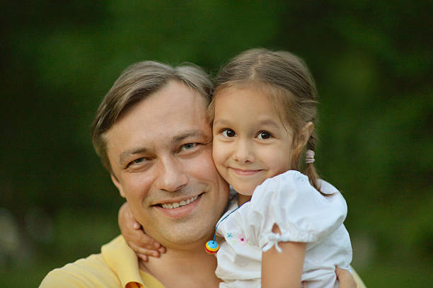 istock Father with daughter in park 491267806