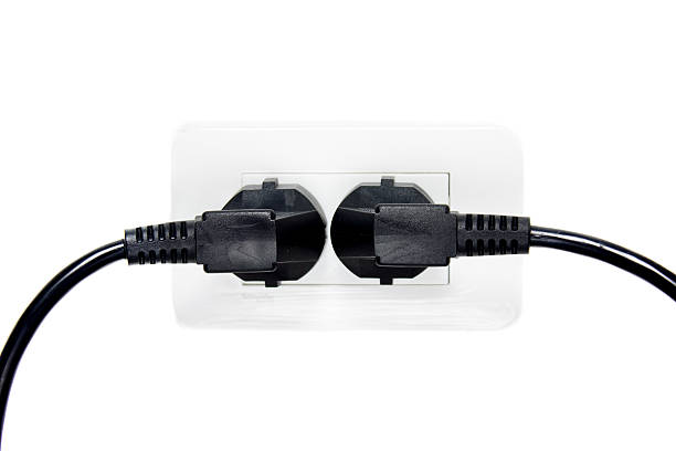 istock twin plugs in white electric bord 491267826
