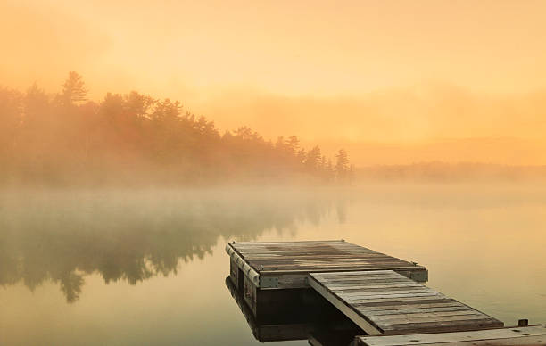 Cottage Foggy Sunrise stock photo