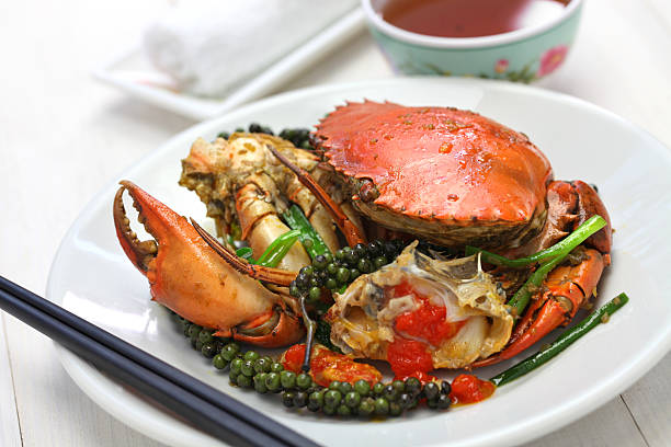 kampot green pepper crab stir-fried crab with green kampot pepper, cambodian cuisine kep stock pictures, royalty-free photos & images