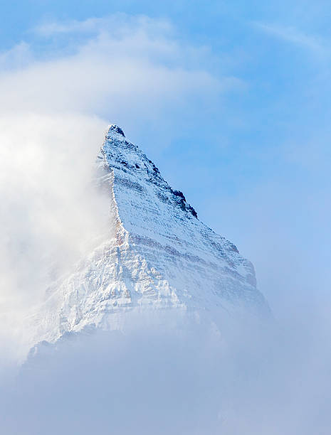 istock Pyramid Shaped Mount Assiniboine in the Fog 491278890