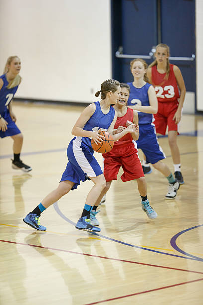 istock Girls high school basketball 491280194