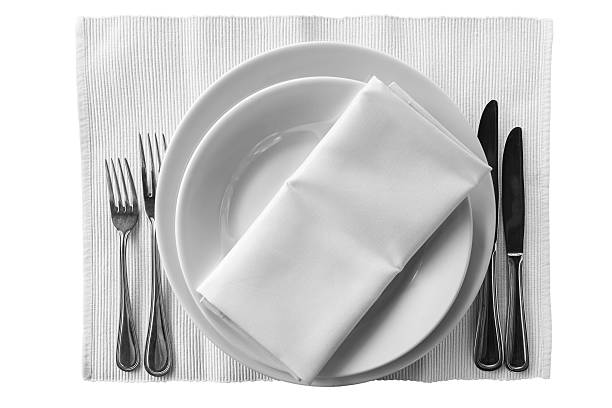 istock plates with knives and forks Isolation 491280732