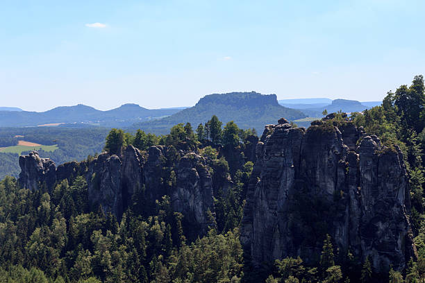 istock Panorama with rocks Bastei and mountain Lilienstein, Saxon Switzerland 491281408