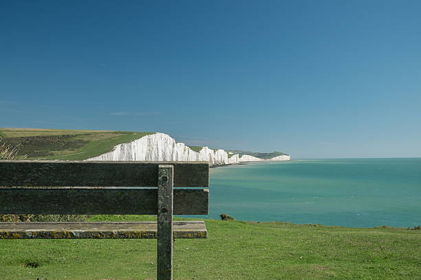 Wooden bench at Seven Sisters stock photo