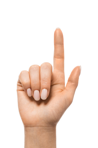 Closeup shot of a hand simulating pressing something with index finger on white background