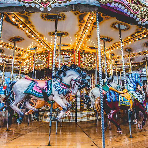 istock Old French carousel in a holiday park. 491291402