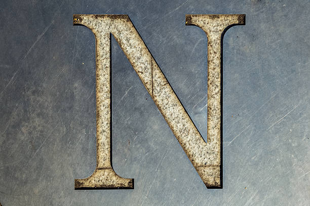 istock letter N cut in the metal sheet 491293016