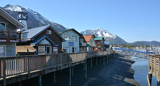 Seward Alaska Seward, United States - May 29, 2015: The tranquil waters of the Seward waterfront in a sunny summer morning. seward alaska stock pictures, royalty-free photos & images