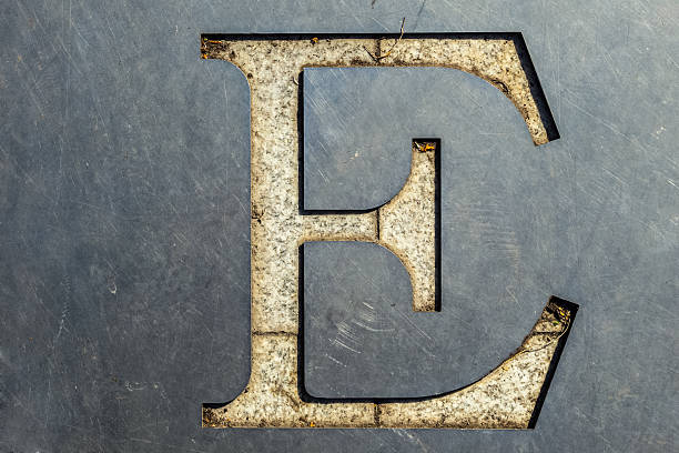 istock letter E cut in the metal sheet 491293044
