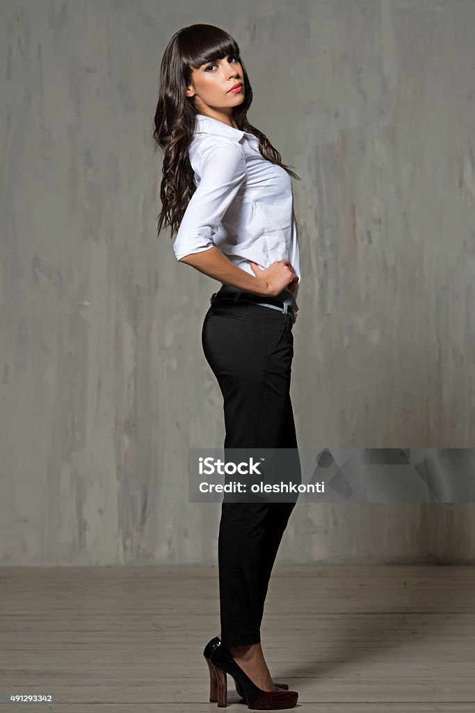 the slender woman in a shirt and trousers 2015 Stock Photo