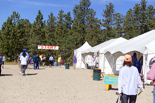 Black Hills, South Dakota, USA - September 27, 2015: The bi-annual Volksmarch is an organized 10k hike up to the face of Crazy Horse Mountain, the largest mountain stone carving still in progress.