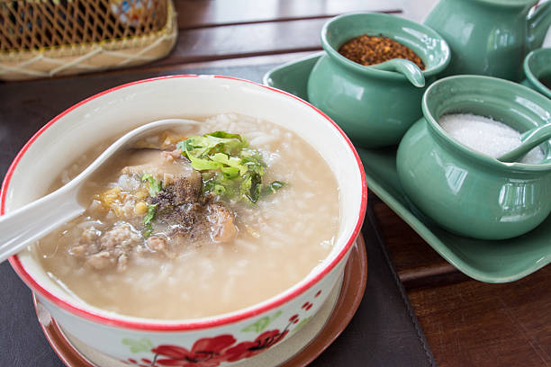 istock Asian style breakfast soft boiled rice, rice soup Thailand food 491296242