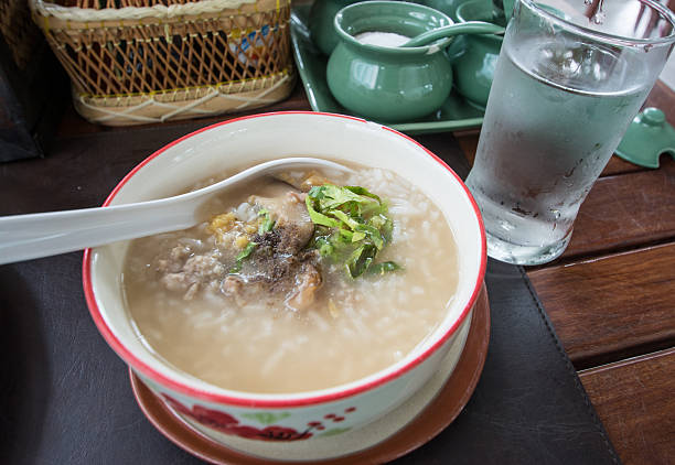 istock Asian style breakfast soft boiled rice, rice soup Thailand food 491296372