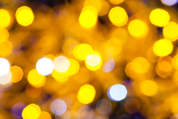 istock dark blue and yellow shimmering Christmas lights 491297078