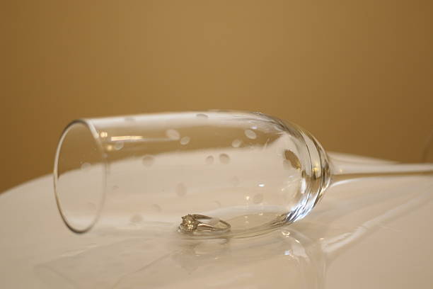 istock Food: Champagne glass with engagement ring - sideways 491297350