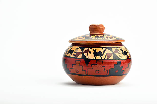 istock Painted handmade ceramic pot with lid isolated on white 491298016