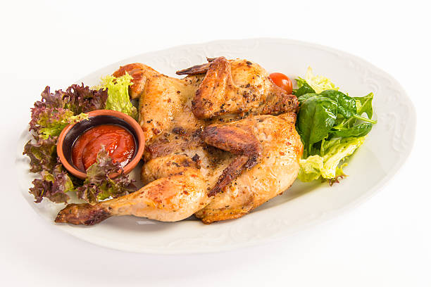 istock Grilled chicken on the plate with salad 491310140