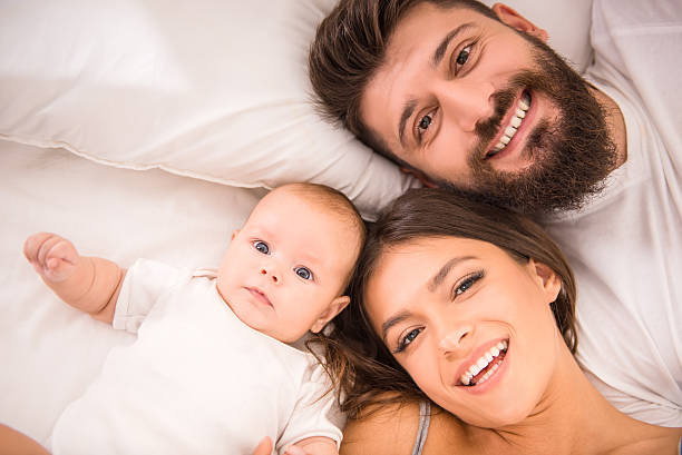 istock Parents and baby 491310636